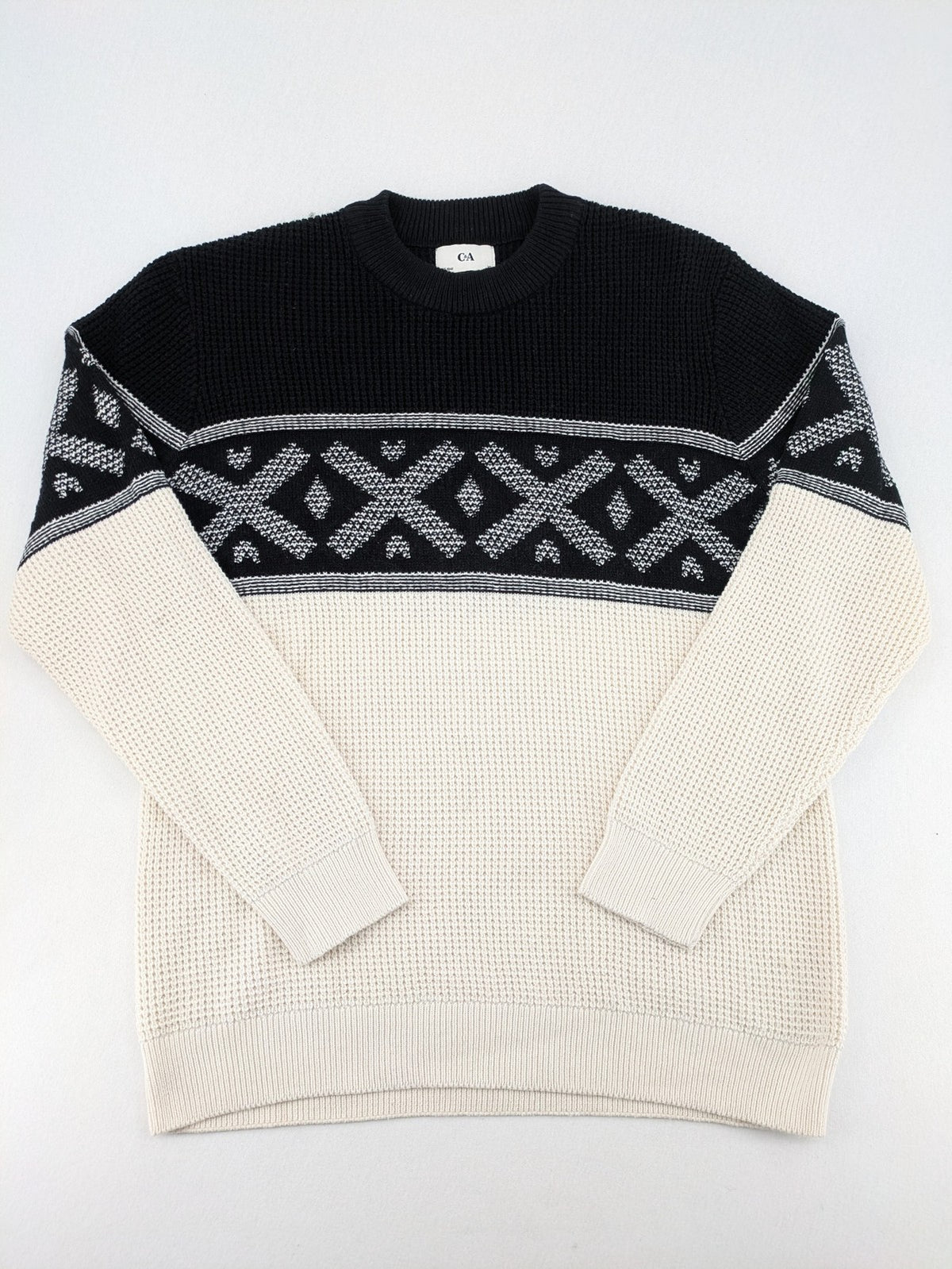 C&A turtle neck jumper black cream with Nordic pattern and waffle knit texture.
