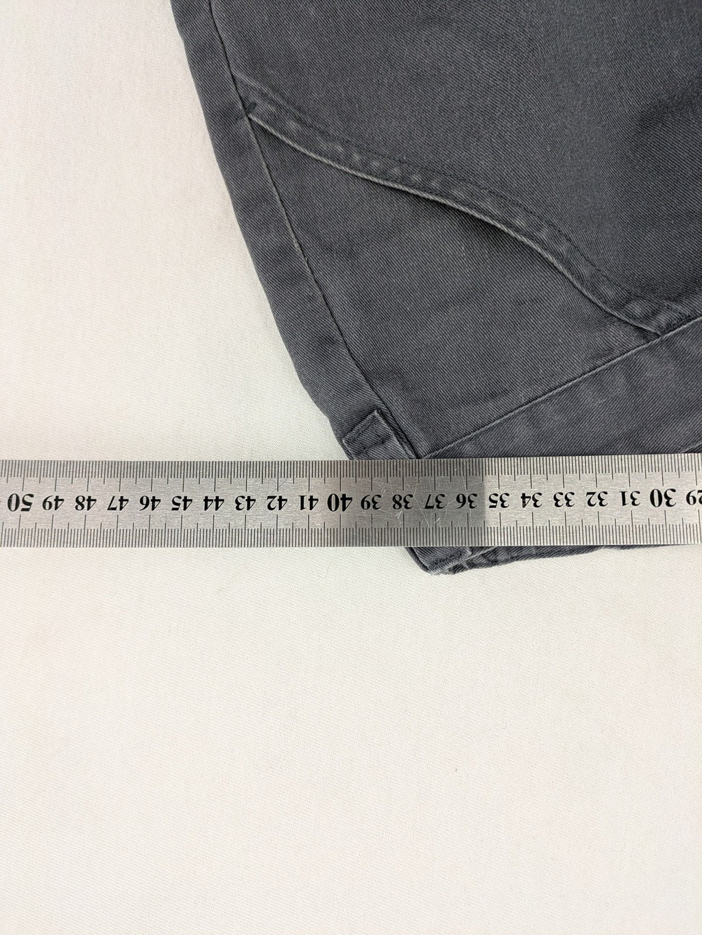 Watsons grey and black hunting tactical pants with Cordura reinforcements and elastic waistband.