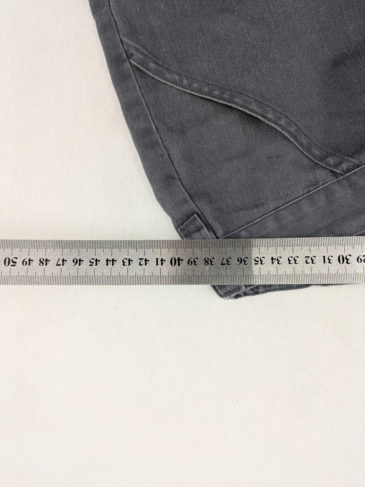 Watsons grey and black hunting tactical pants with Cordura reinforcements and elastic waistband.