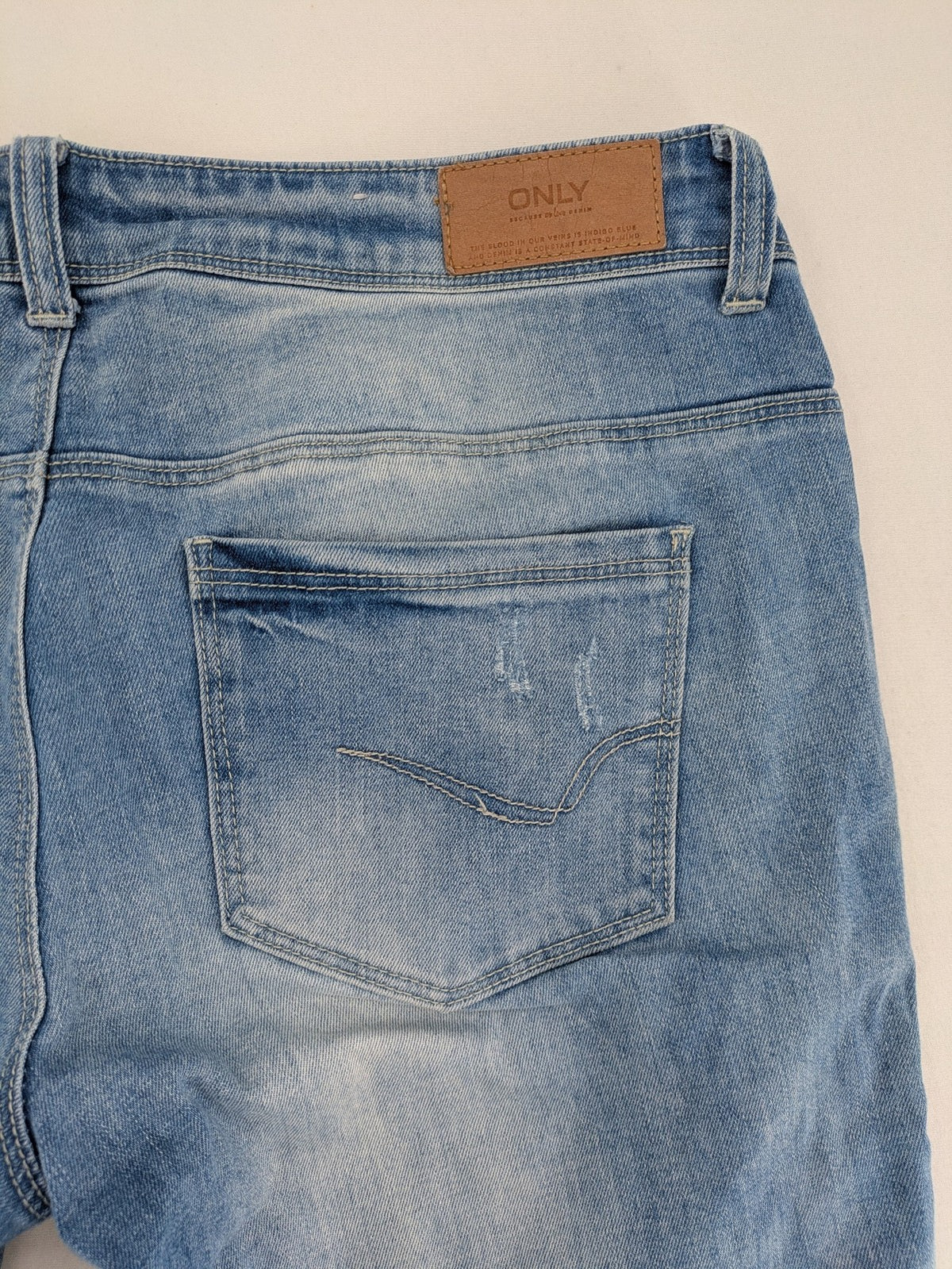 ONLY skinny jeans superlow coral orange pink distressed denim with modern used-look details.