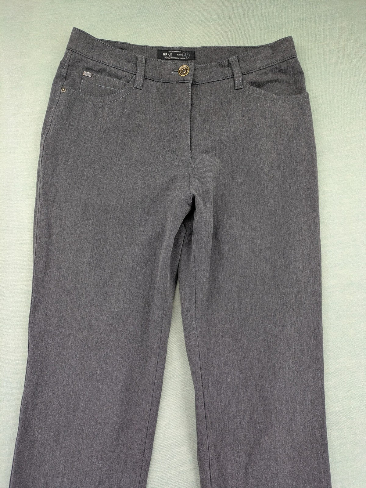 BRAX pants pink 5-pocket design with stretch material and logo detail.