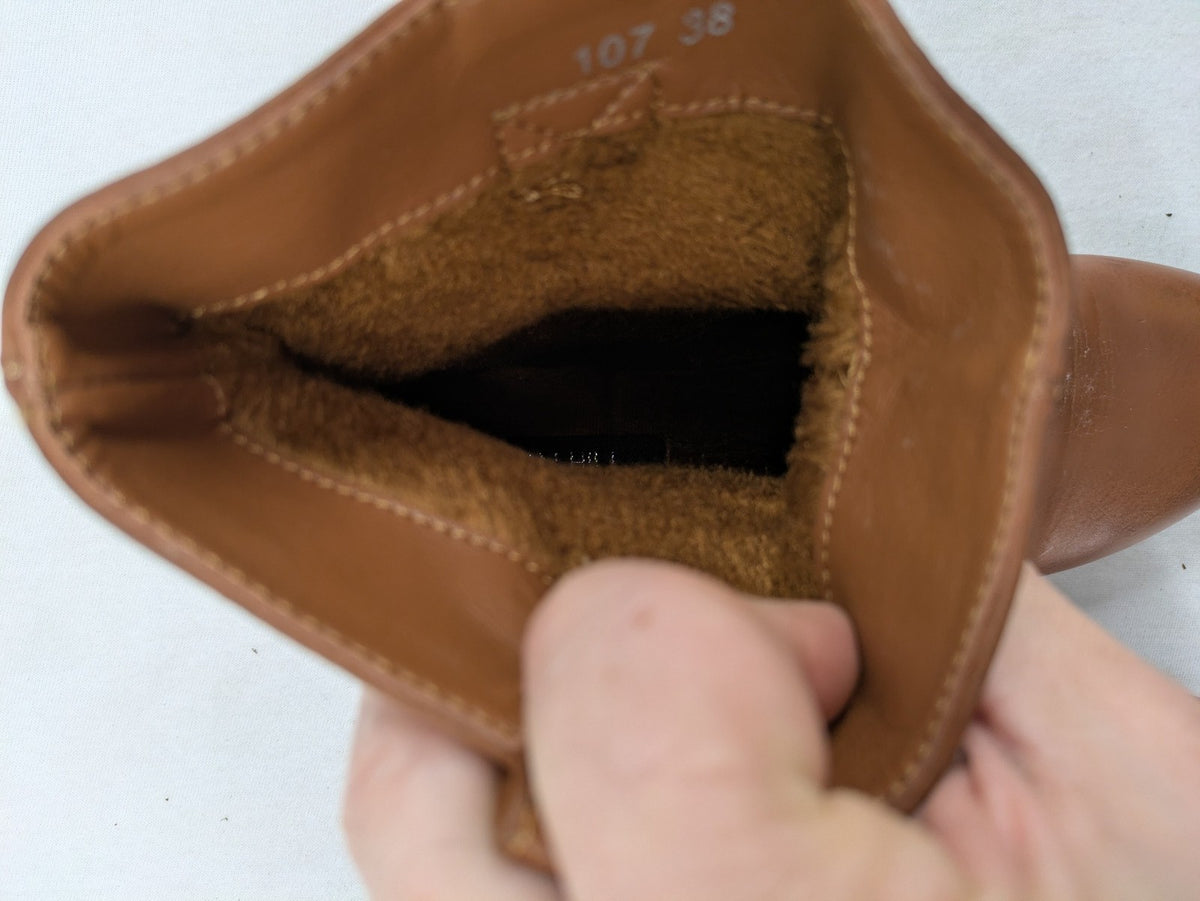Van Hill brown ankle boots with slouchy design, fold-over cuff, and soft lining.