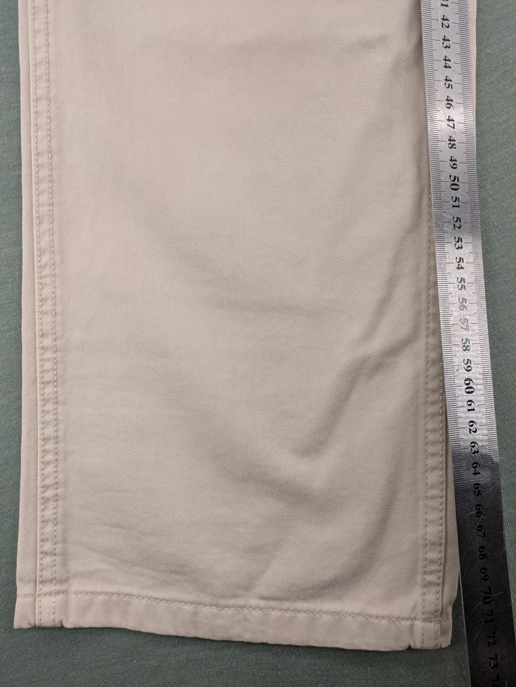 MNG beige cargo pants with straight leg, button closure, and patch pockets.