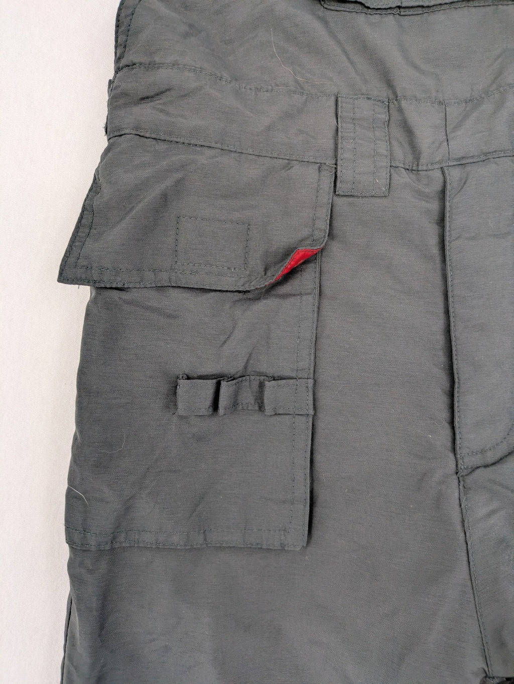 H&M grey snow pants with red accents, adjustable straps, and multiple cargo pockets.
