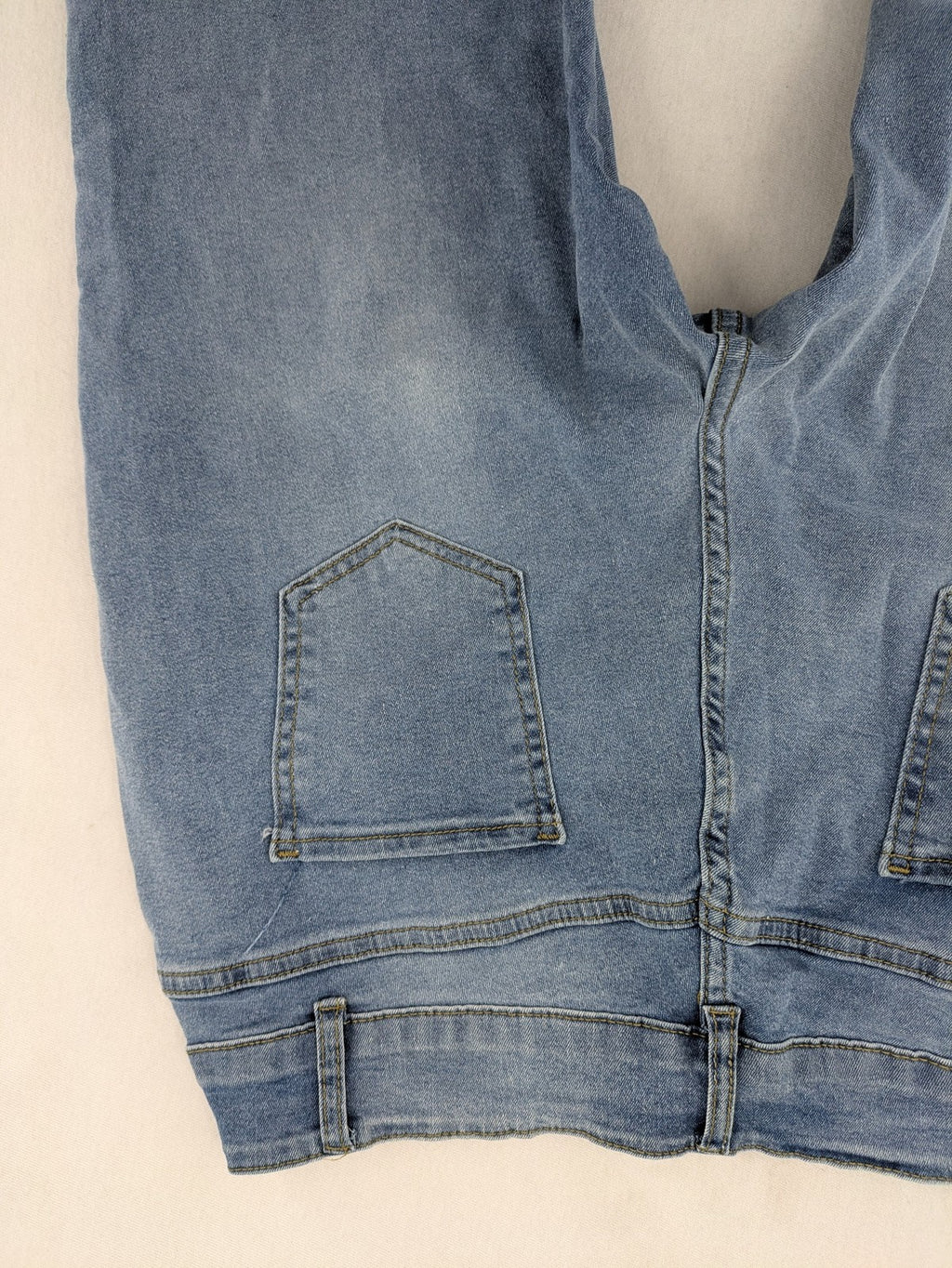 C&A blue bootcut jeans high waist stretch denim with double button closure.