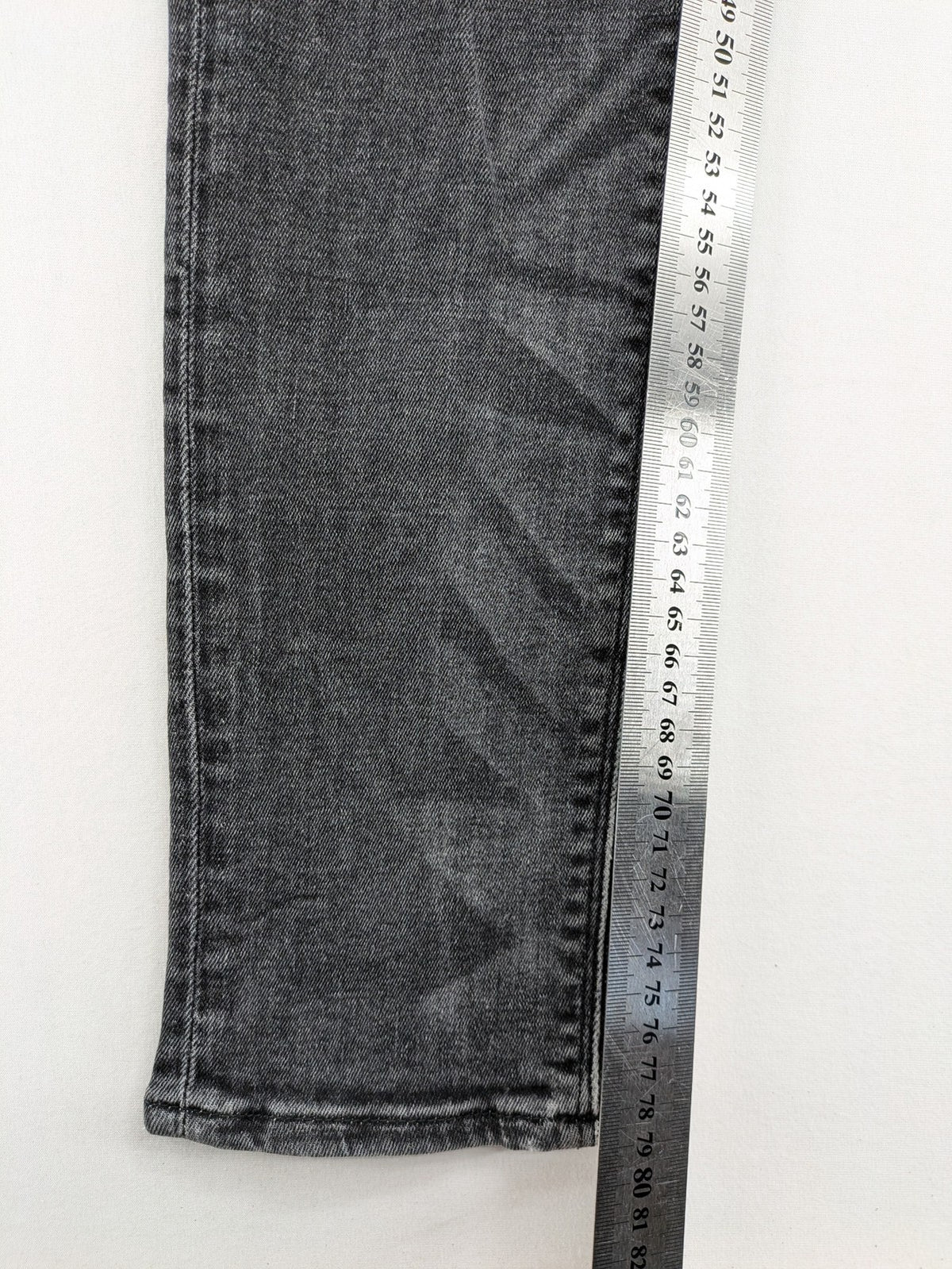 H&M grey skinny jeans with low rise, classic 5-pocket style, and washed denim finish.