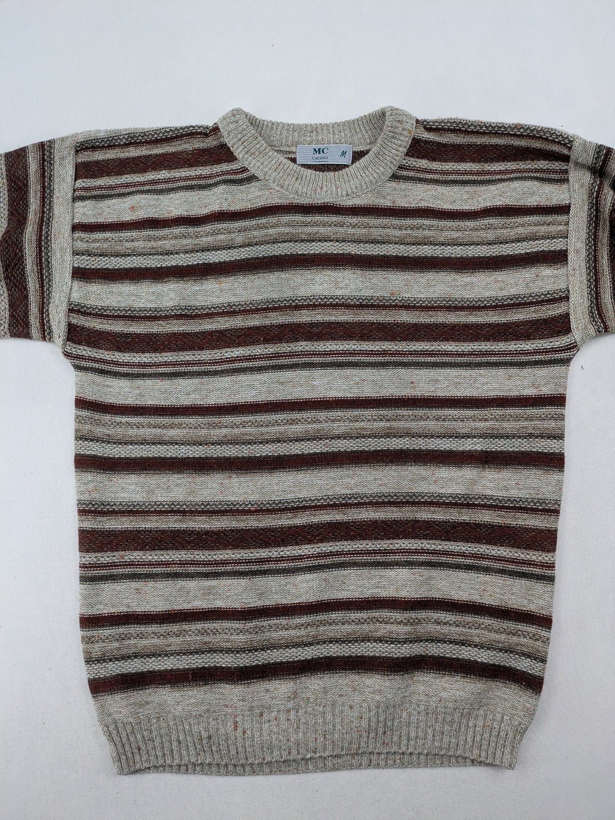 MC Casuals multi turtle neck jumper vintage striped pattern in brown and grey acrylic.