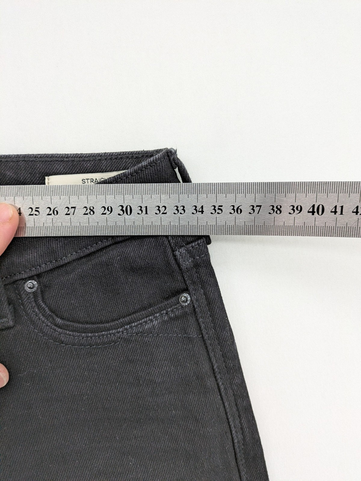 Esprit grey straight jeans with medium rise and original tags, classic denim style.