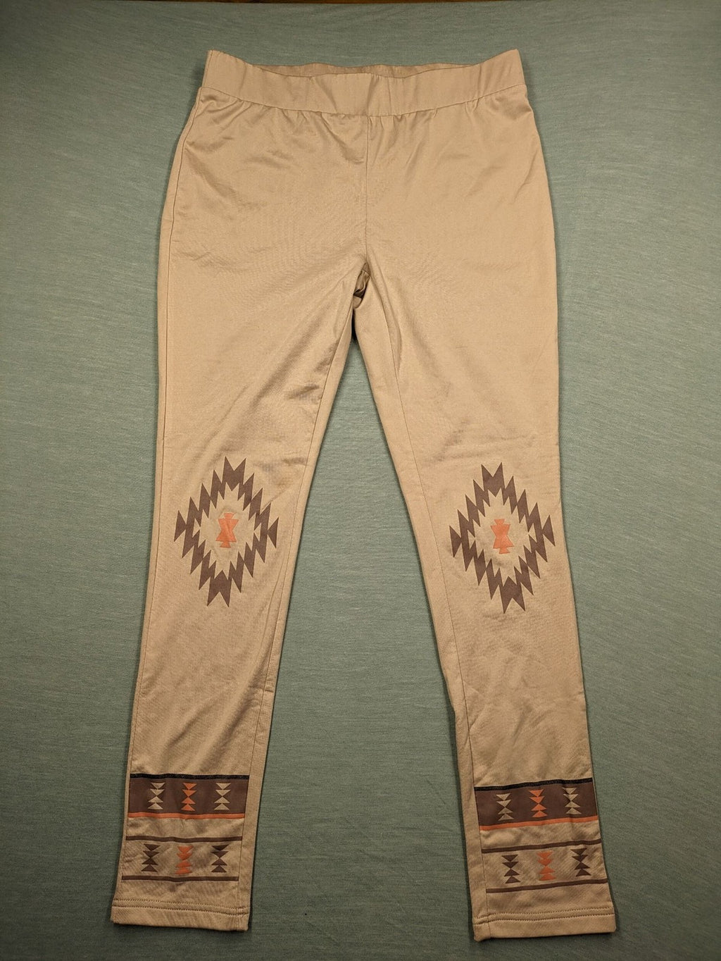 bpc bonprix collection beige leggings with colorful Aztec pattern at knees and hem