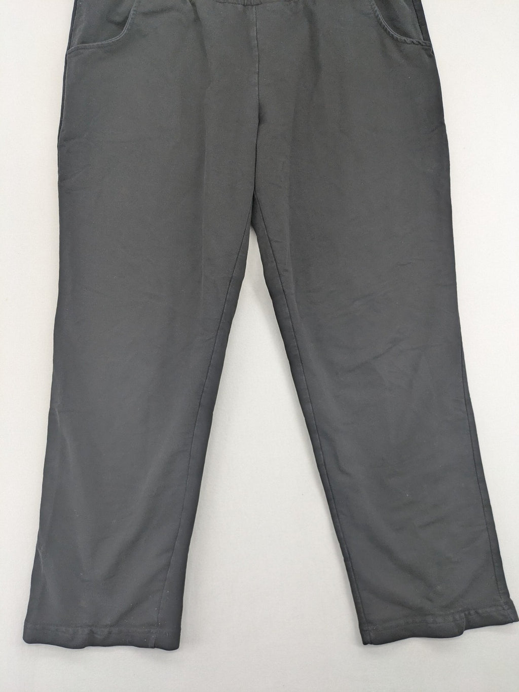 BWEST grey pants with elastic waistband and side pockets for comfort and functionality.