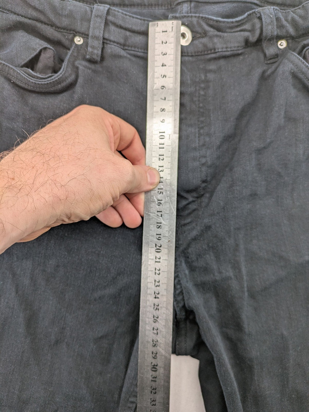 H&M grey skinny jeans with faded wash and soft stretch denim material.