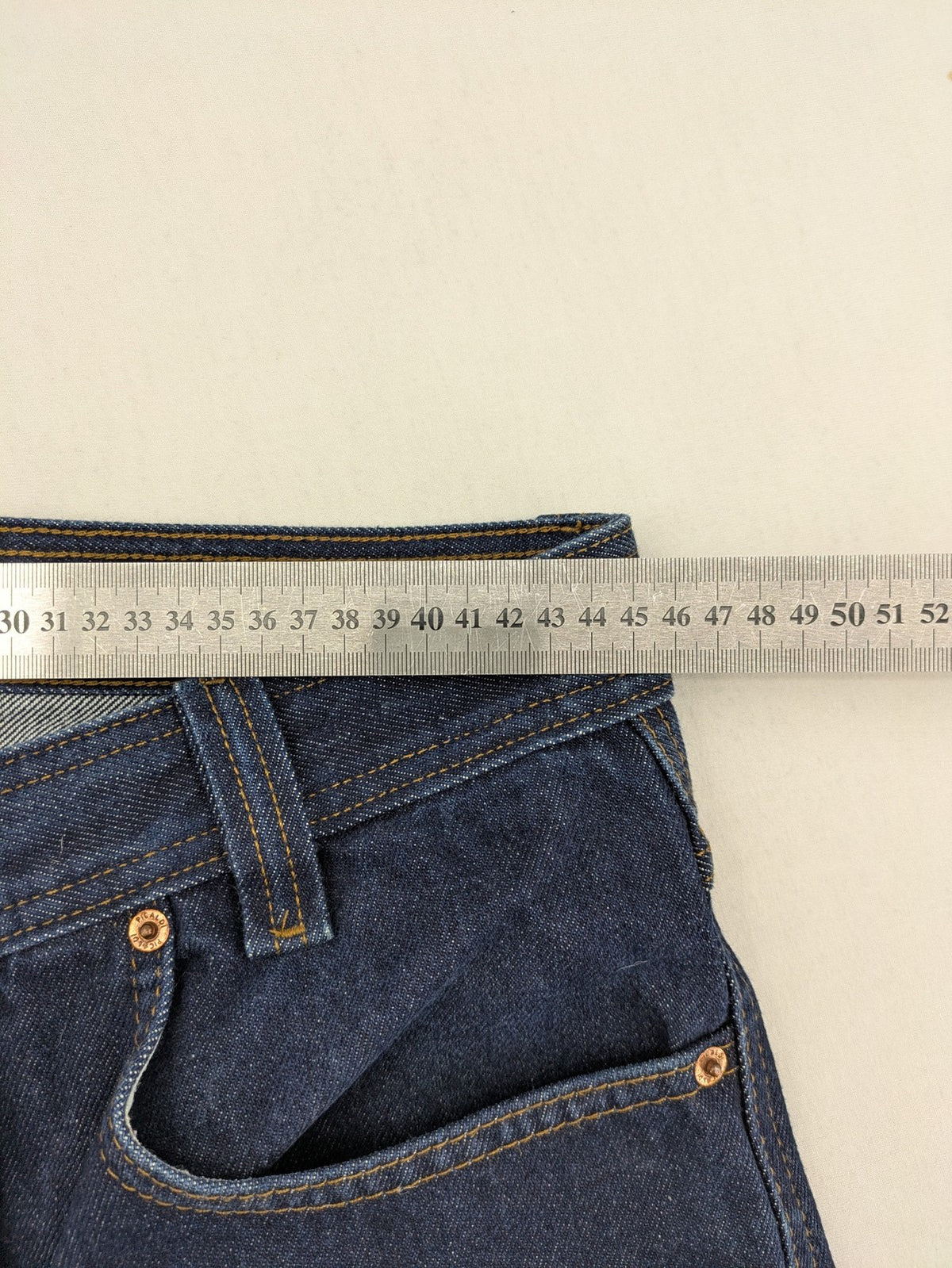 Picaldi blue straight jeans with button fly and frayed hem, 5-pocket design.