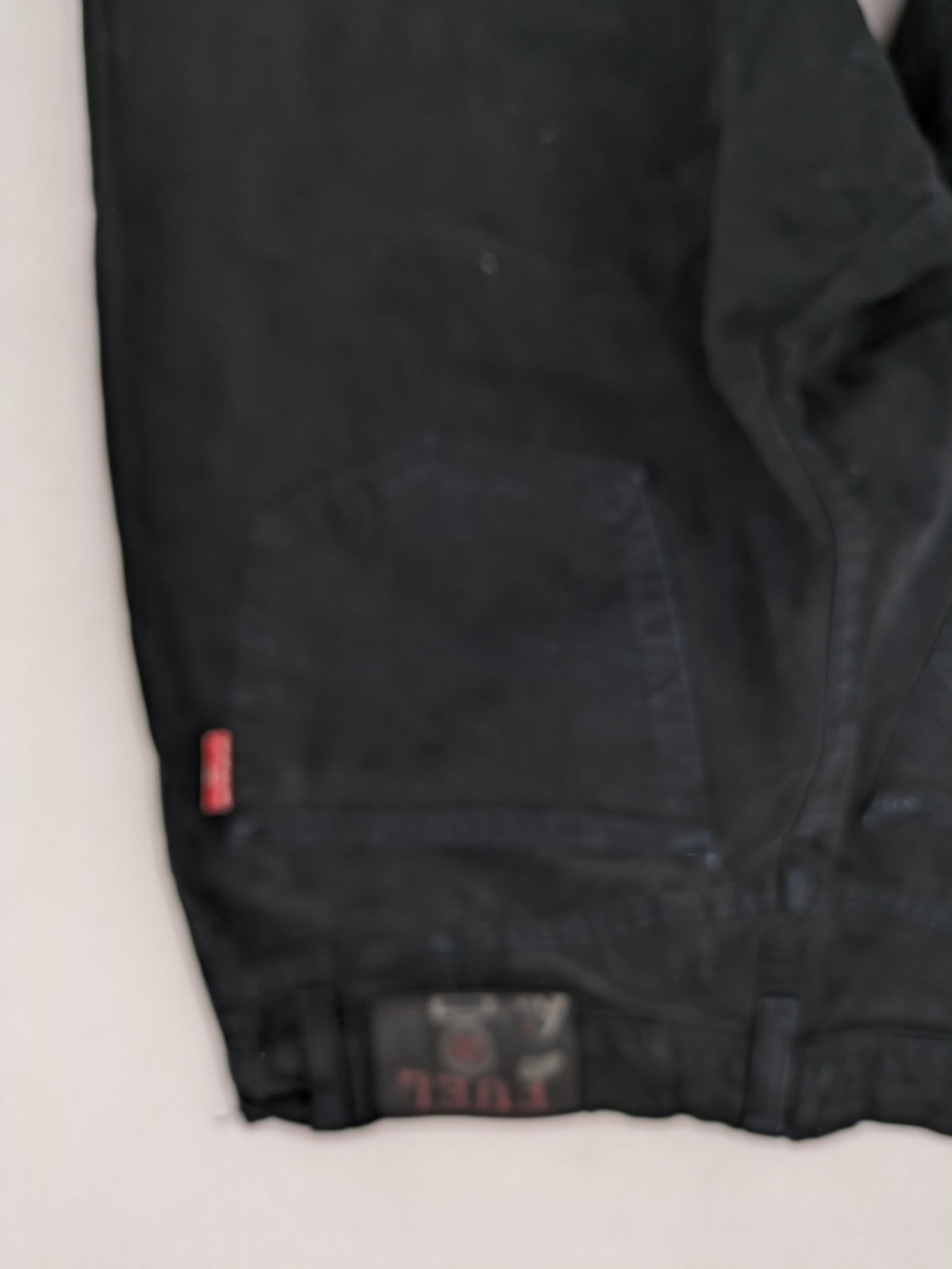 Fuel black straight jeans with 5-pocket design and branded leather patch.