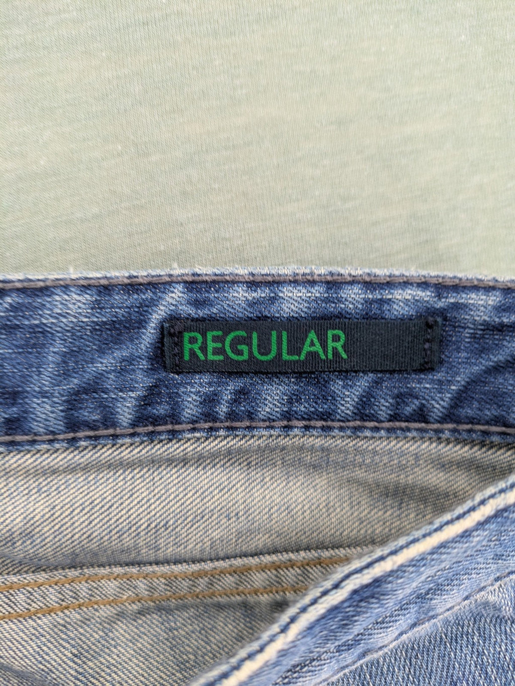 Benetton Jeans blue straight leg denim with button fly and classic design.