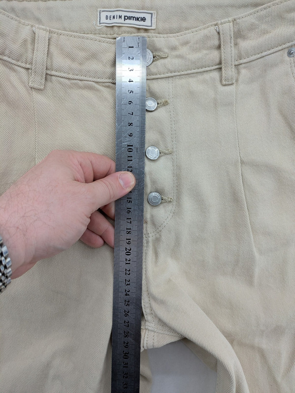 Pimkie beige mom jeans high waist tapered fit with front button placket and cotton material.