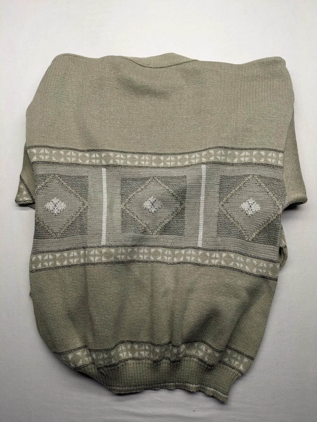 Lewträger cream and grey turtle neck jumper with geometric pattern and button placket.