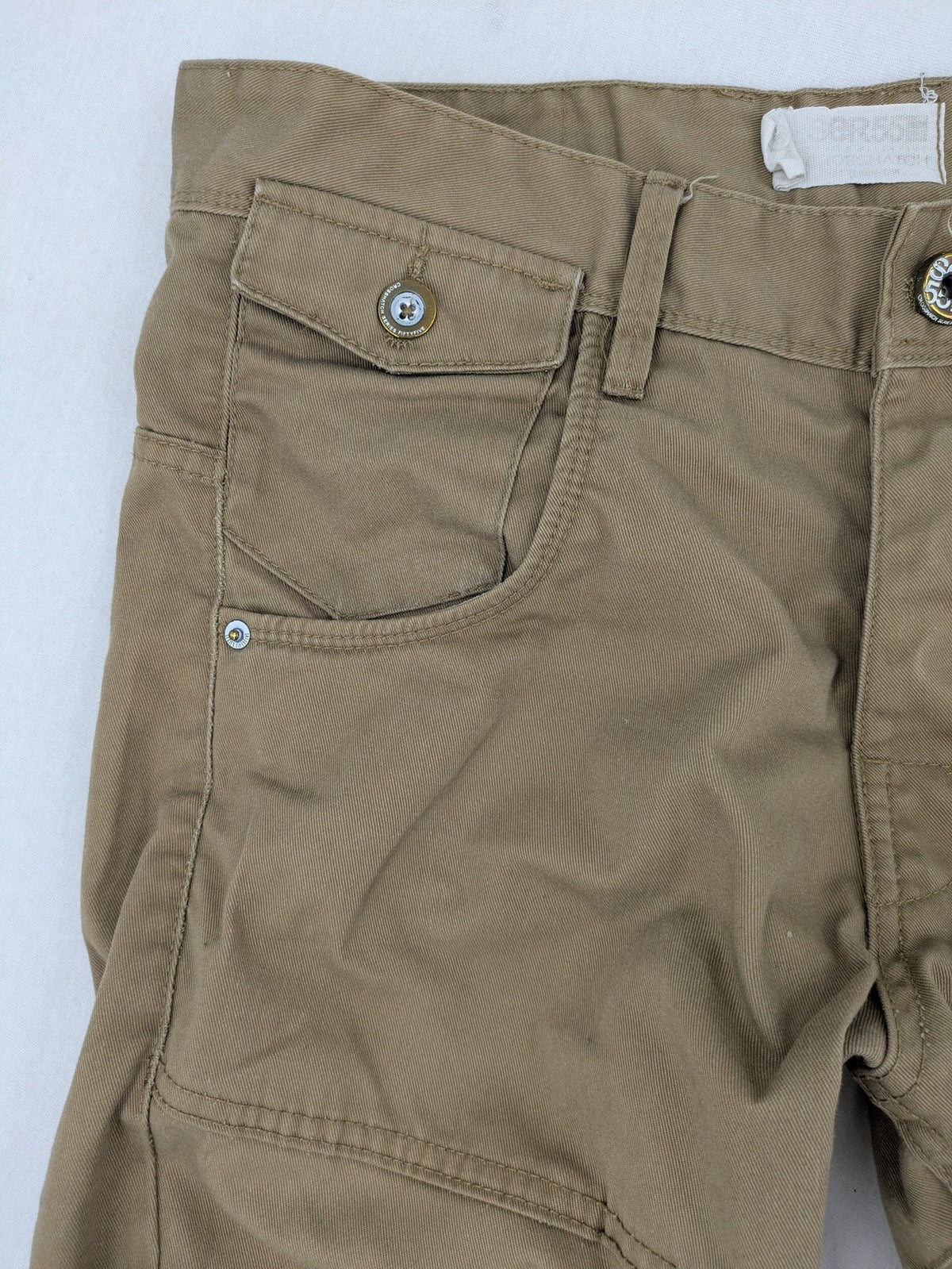 Crosshatch grey cargo pants with multiple pockets and durable cotton-polyester blend.