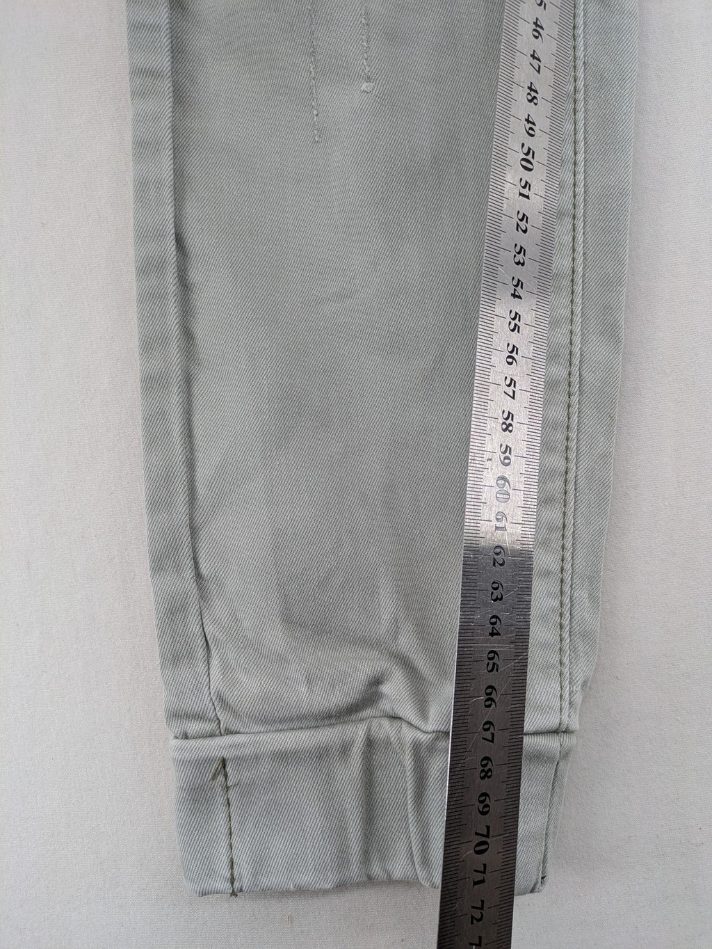 KSCY grey straight jeans with distressed details and ribbed biker inserts.