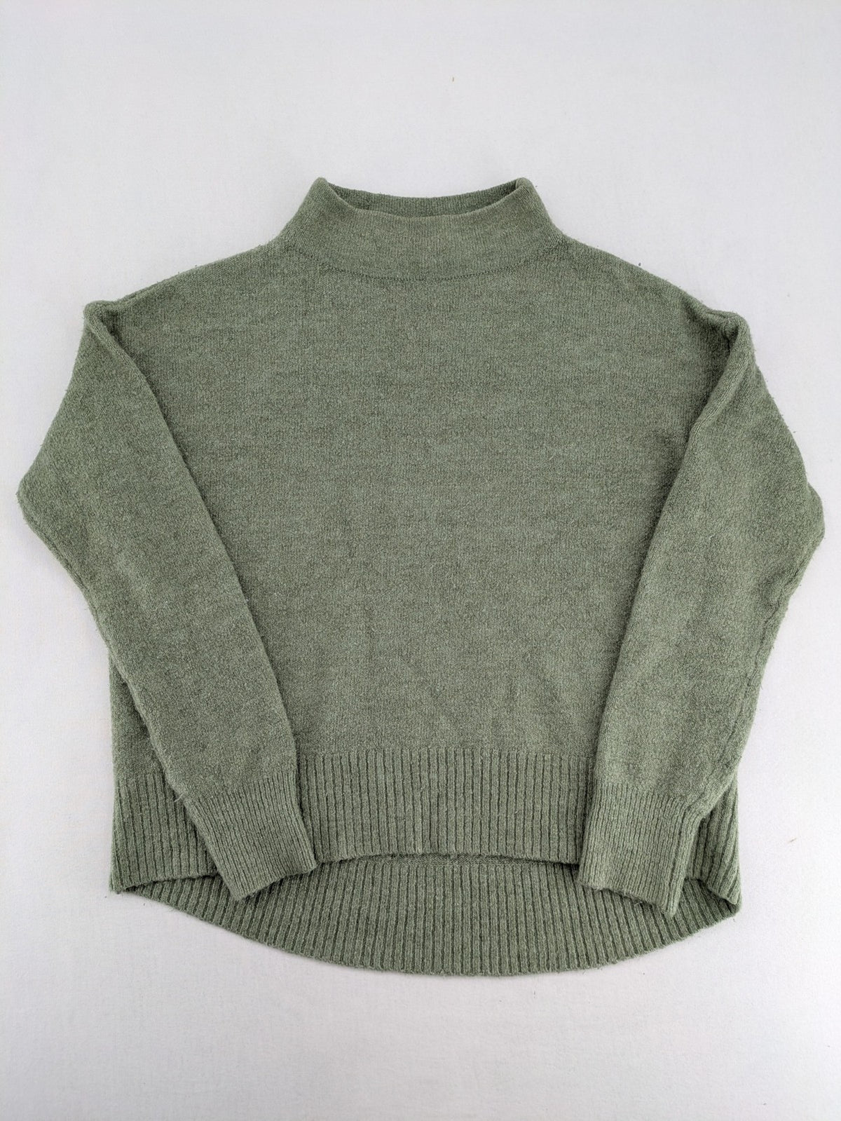 up2 fashion green turtle neck jumper soft knit high-low hem with side slits
