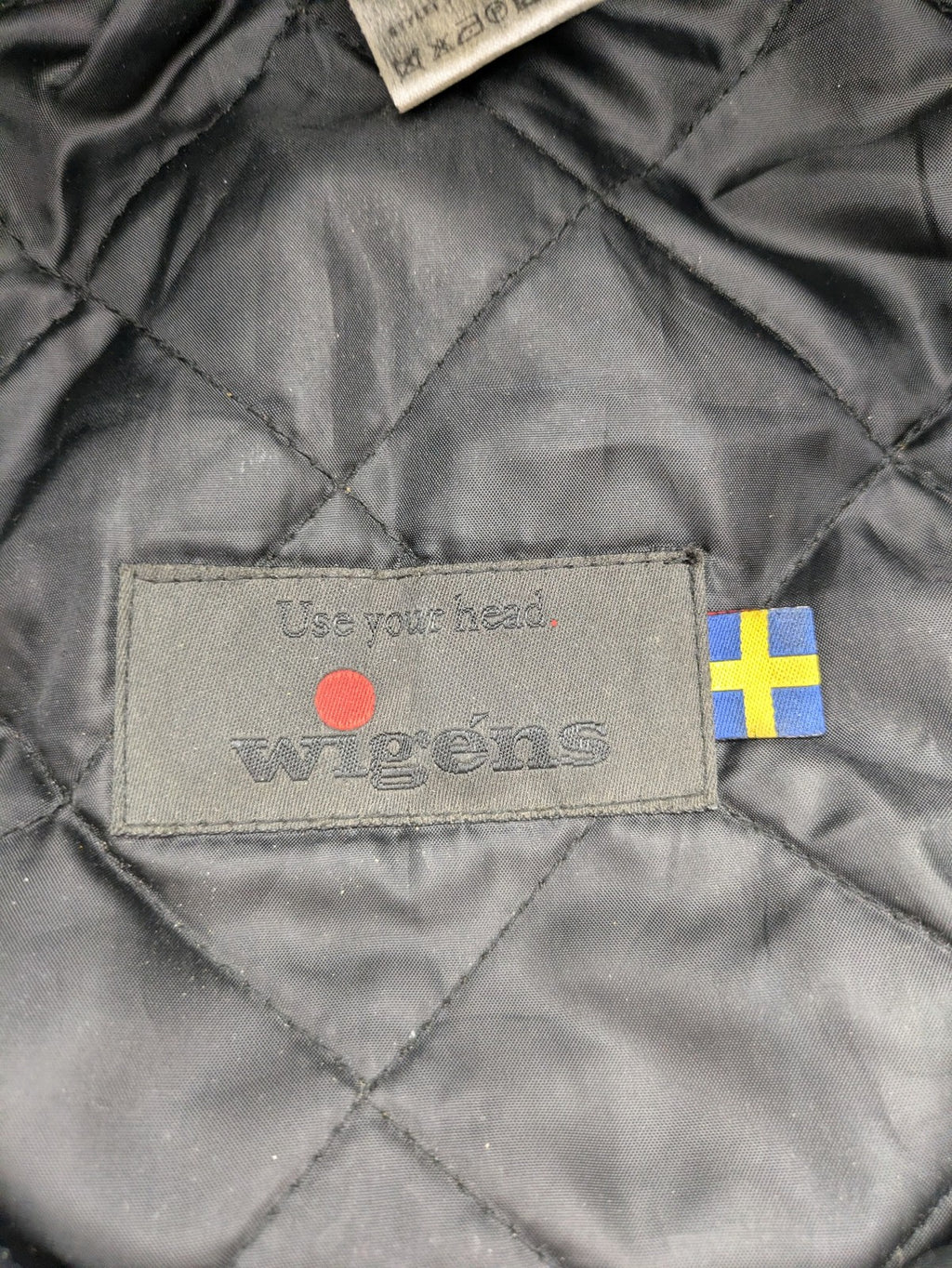 Wigéns grey flat cap wool with foldable ear flaps and classic design.