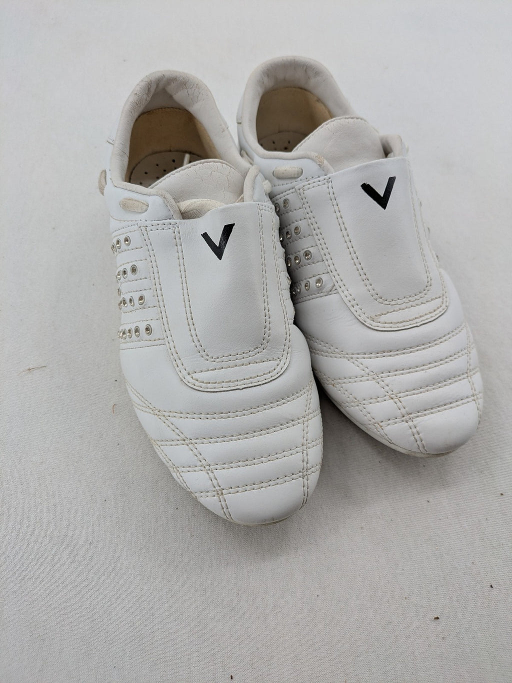Venice low-top sneakers beige and white with rhinestone embellishments and unique sole pattern.