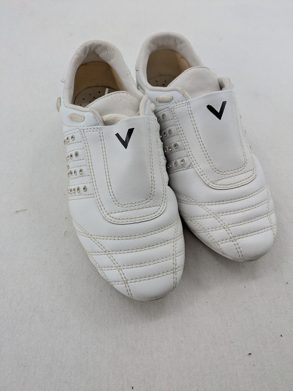 Venice low-top sneakers beige and white with rhinestone embellishments and unique sole pattern.
