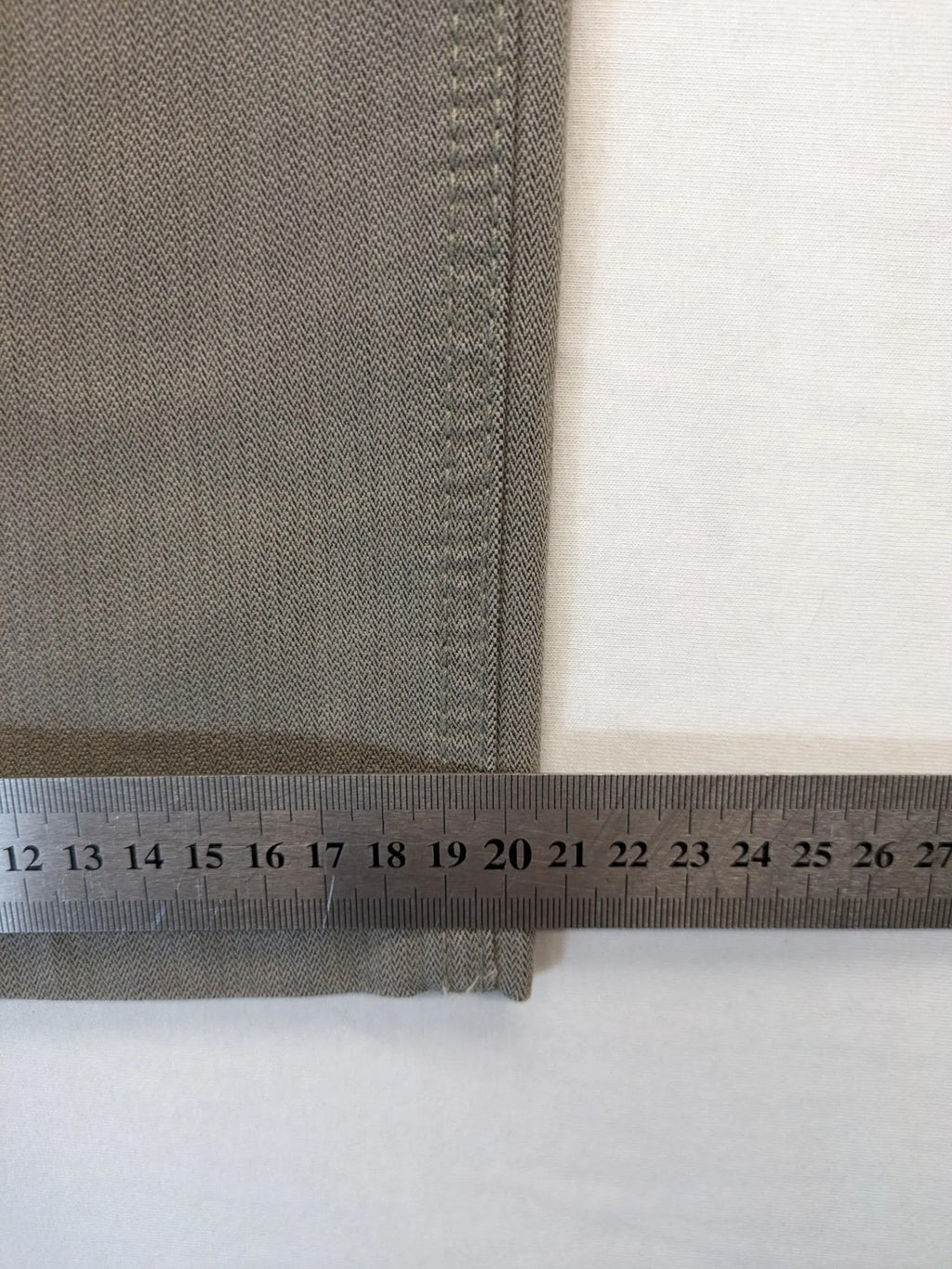 BRAX grey straight jeans 5-pocket design with zipper fly and soft fabric.