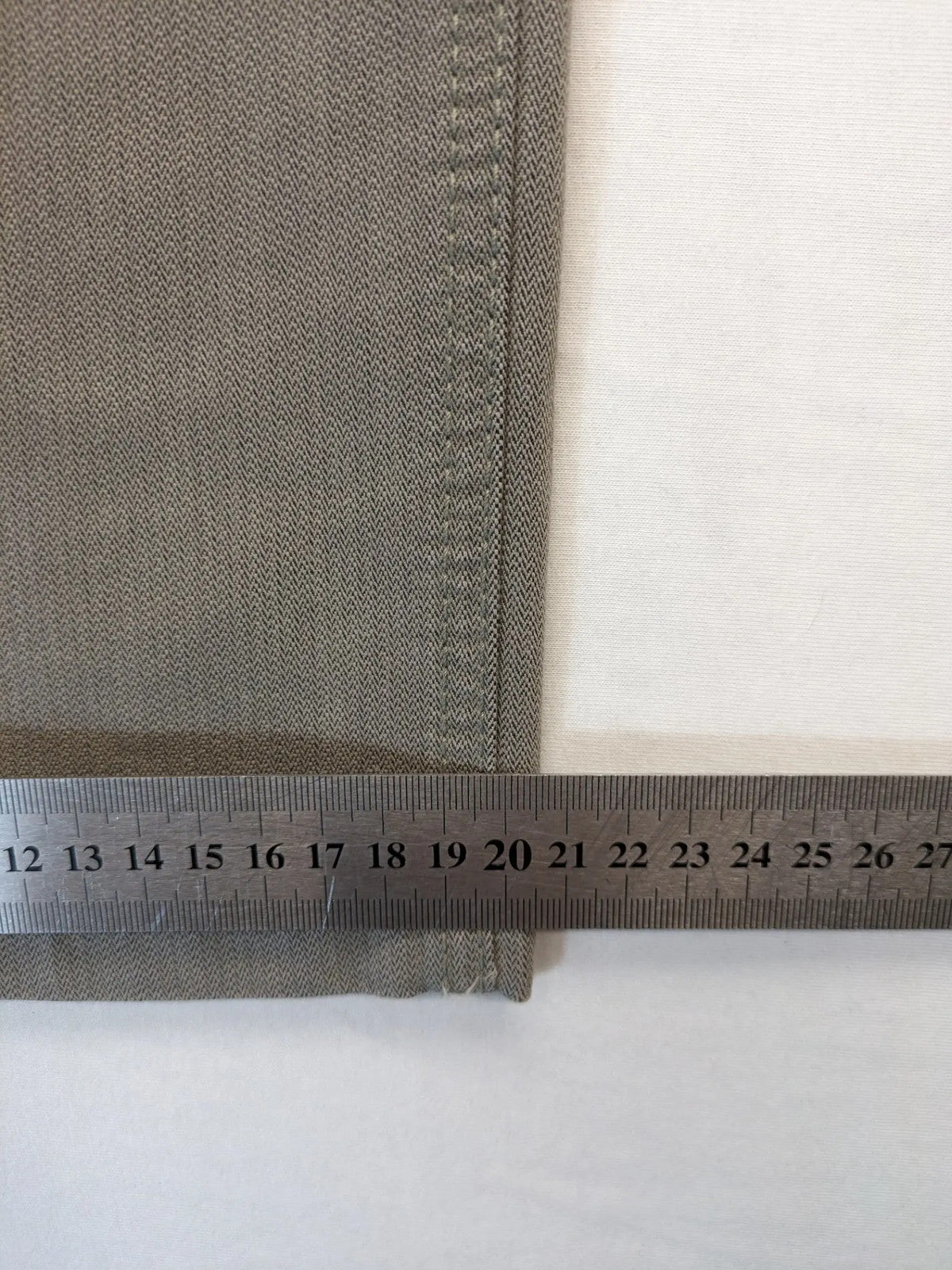 BRAX grey straight jeans 5-pocket design with zipper fly and soft fabric.