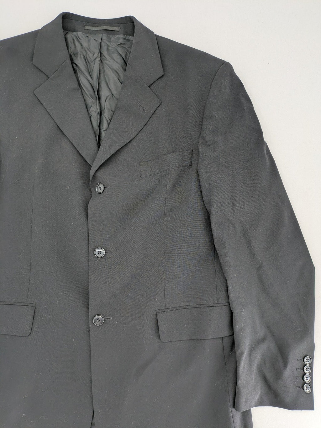 Jake*s pink jacket classic design with falling lapel and three-button closure.