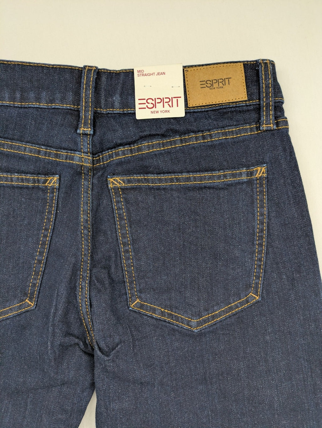 Esprit blue straight leg jeans with contrasting stitching and mid-rise fit.