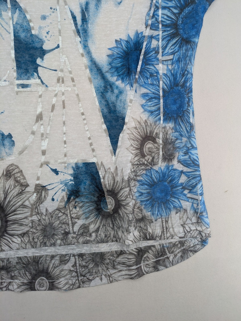 Liberty blue floral print top with metallic "LOVE" lettering, lightweight polyester material.