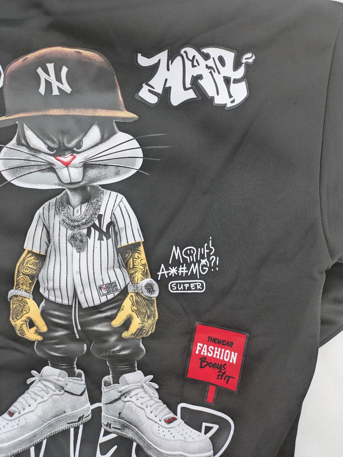 Kuima multi graphic hoodie black featuring large Bugs Bunny print and kangaroo pocket.