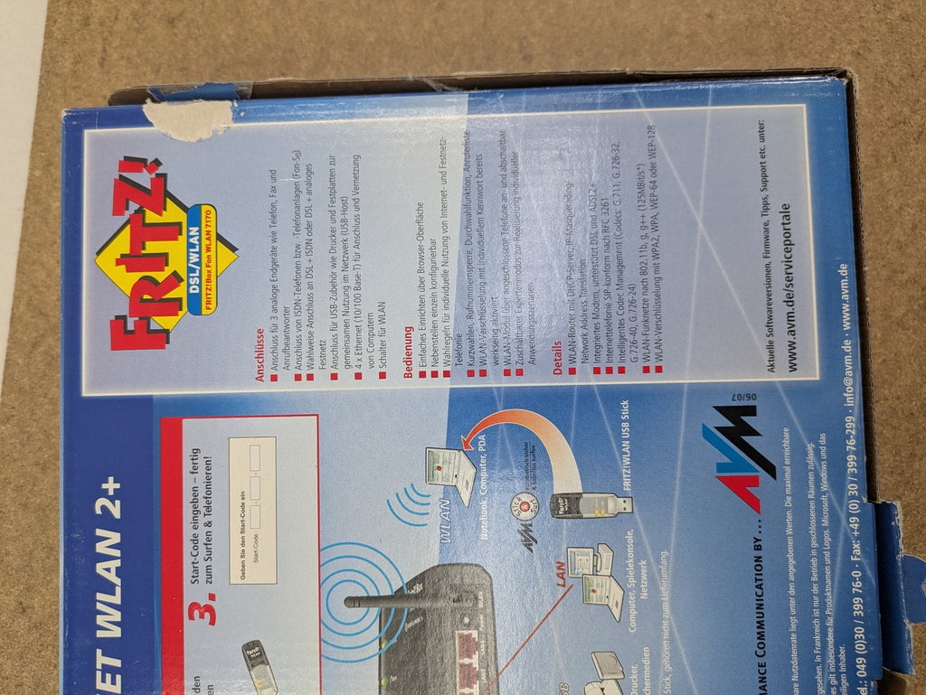AVM VoIP gateway router blue with integrated DSL modem and phone system features.