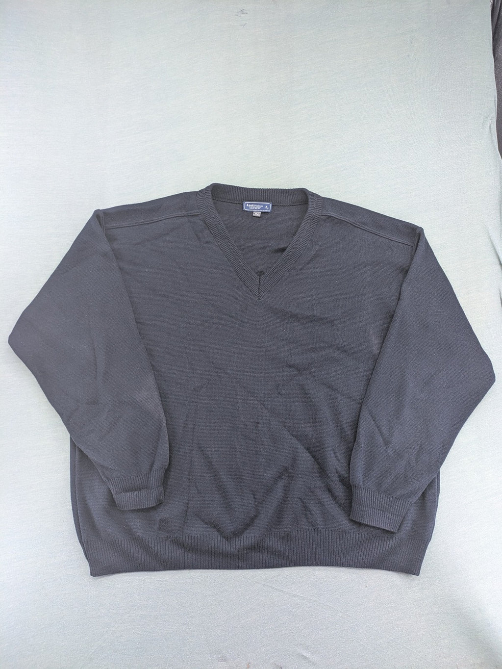 Louis Fashion grey turtle neck jumper with V-neck and ribbed cuffs.