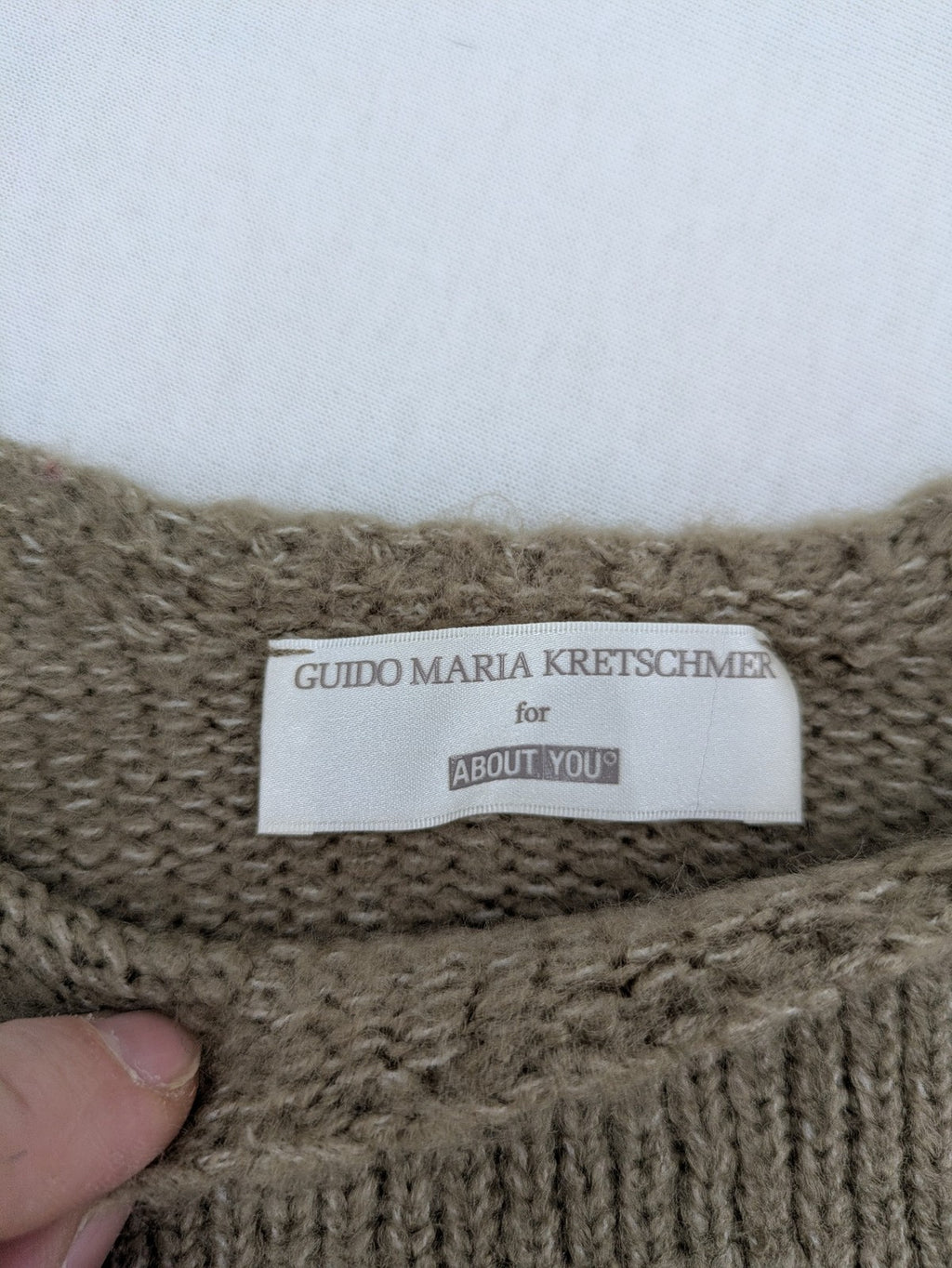 Guido Maria Kretschmer multi turtle neck jumper colorblock design with bold horizontal stripes.