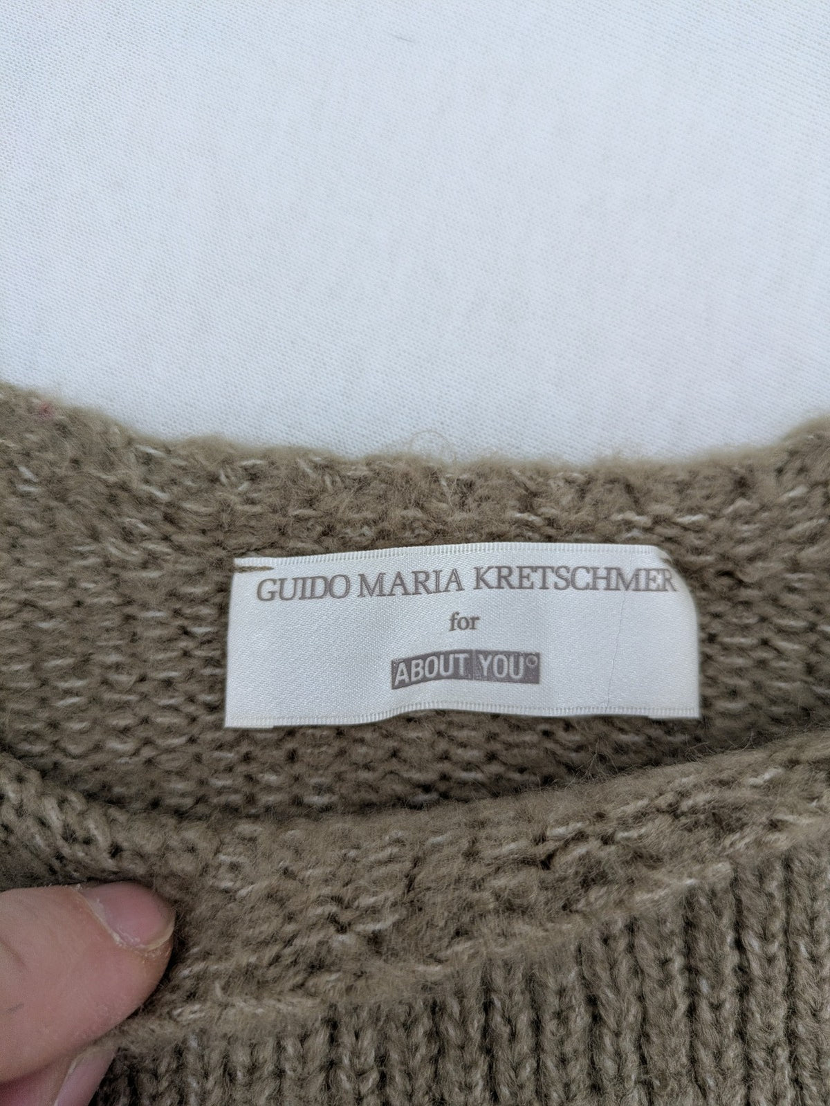 Guido Maria Kretschmer multi turtle neck jumper colorblock design with bold horizontal stripes.