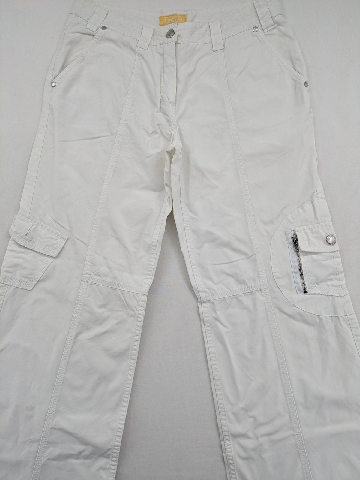 Street One white cargo pants with side pockets and wide leg design.
