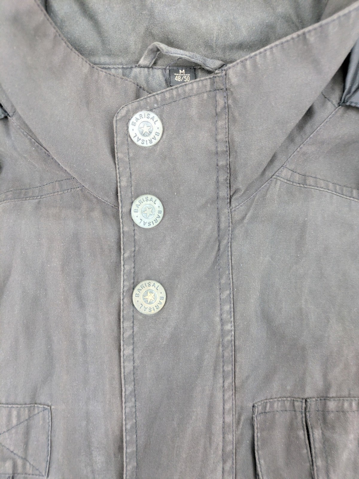 Barisal grey coat with hood, cargo pockets, and checkered lining detail.