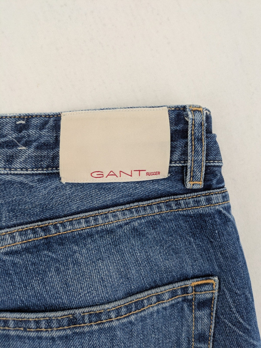 GANT Rugger blue straight leg jeans medium wash, classic button fly, durable cotton denim.