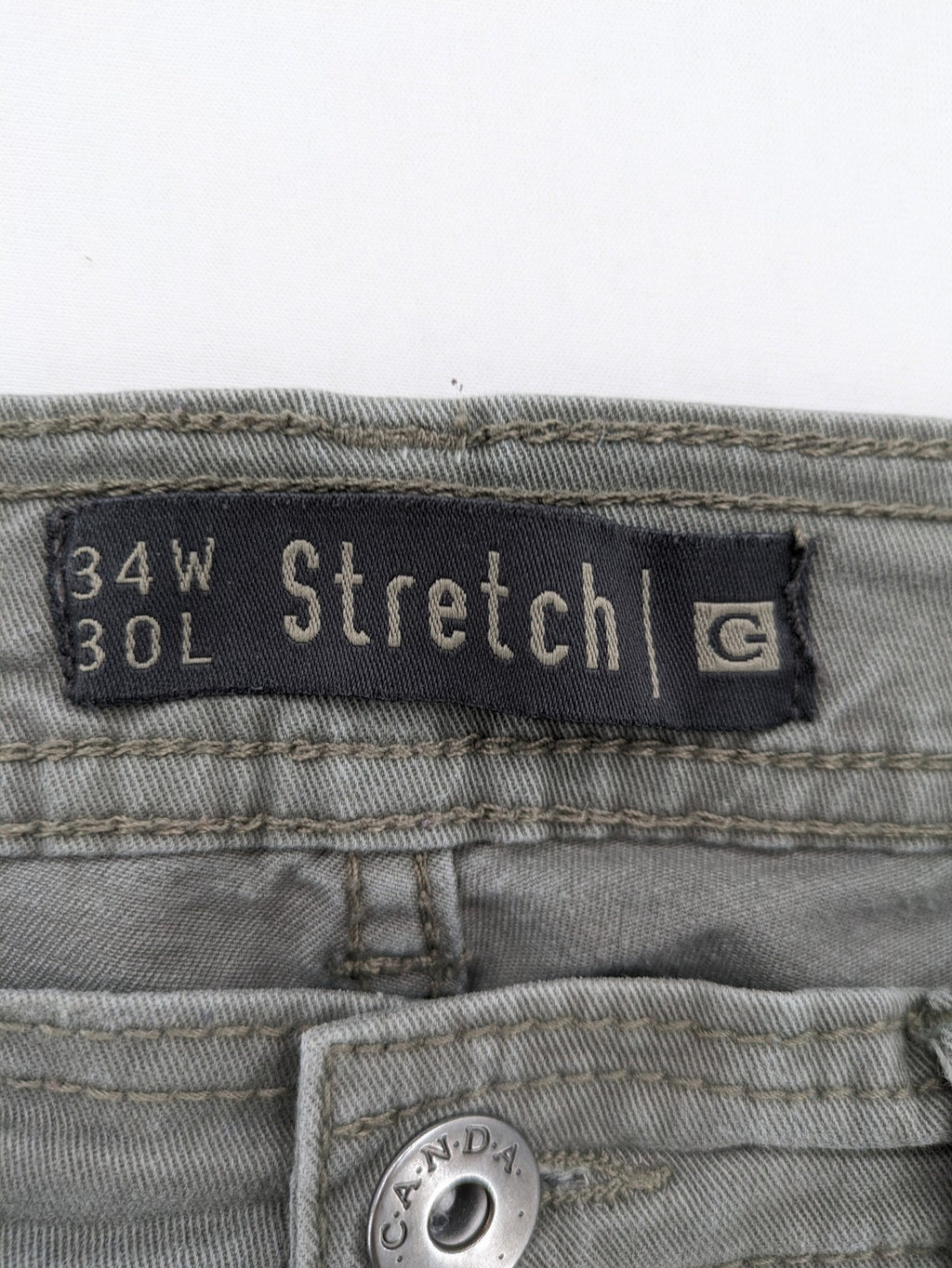 C&A pink chino pants classic 5-pocket style with zipper, made of stretch cotton.