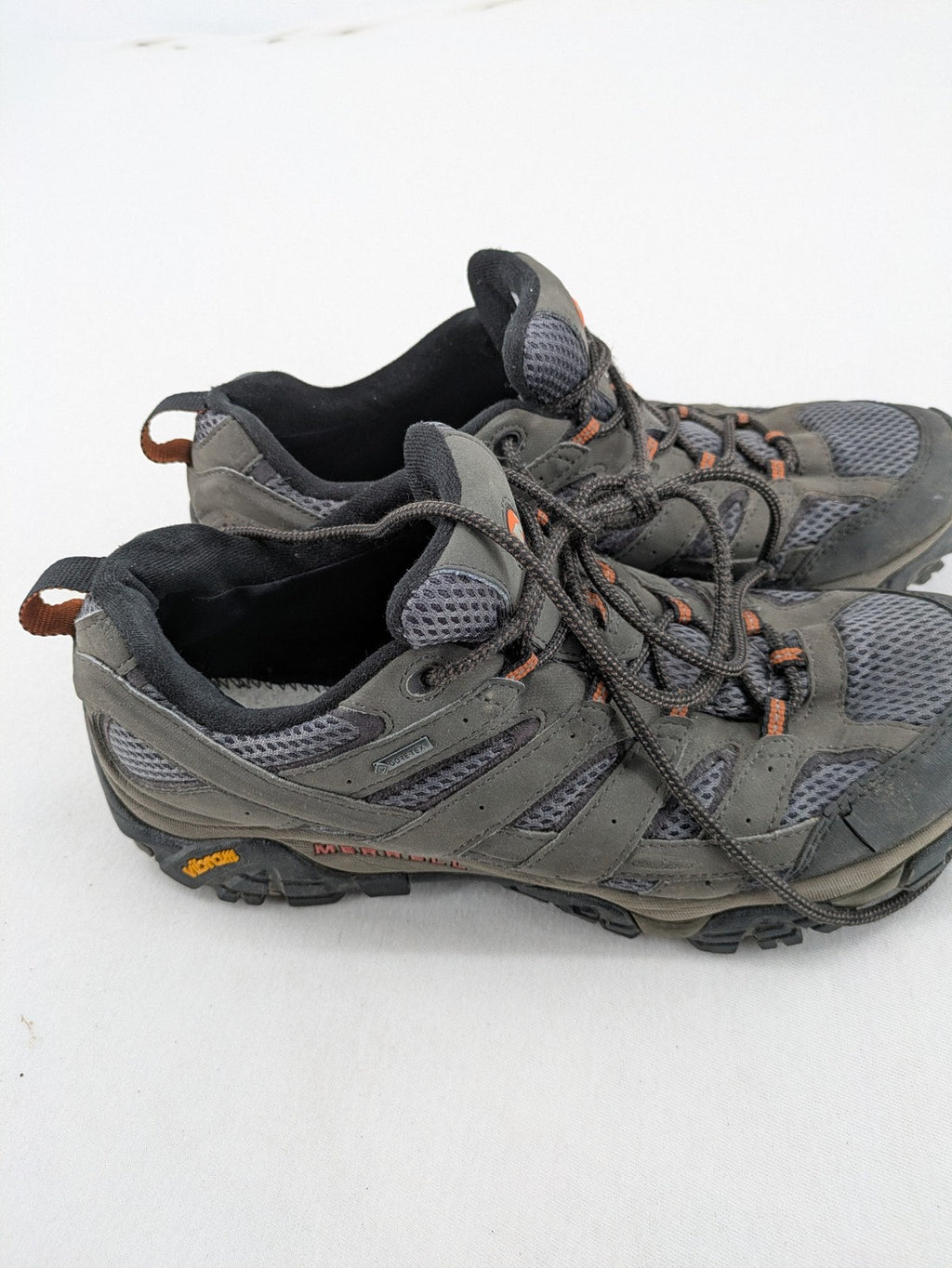 Merrell grey hiking shoes with Gore-Tex membrane and Vibram sole for traction.