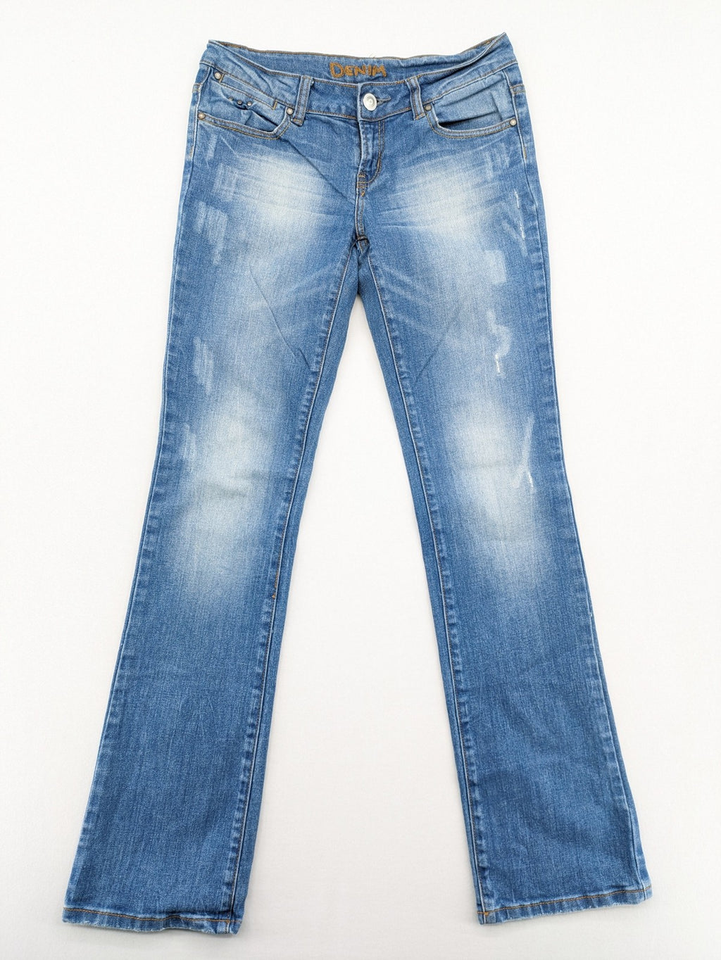 Denim blue straight jeans low rise bootcut with classic 5-pocket design and subtle rivets.