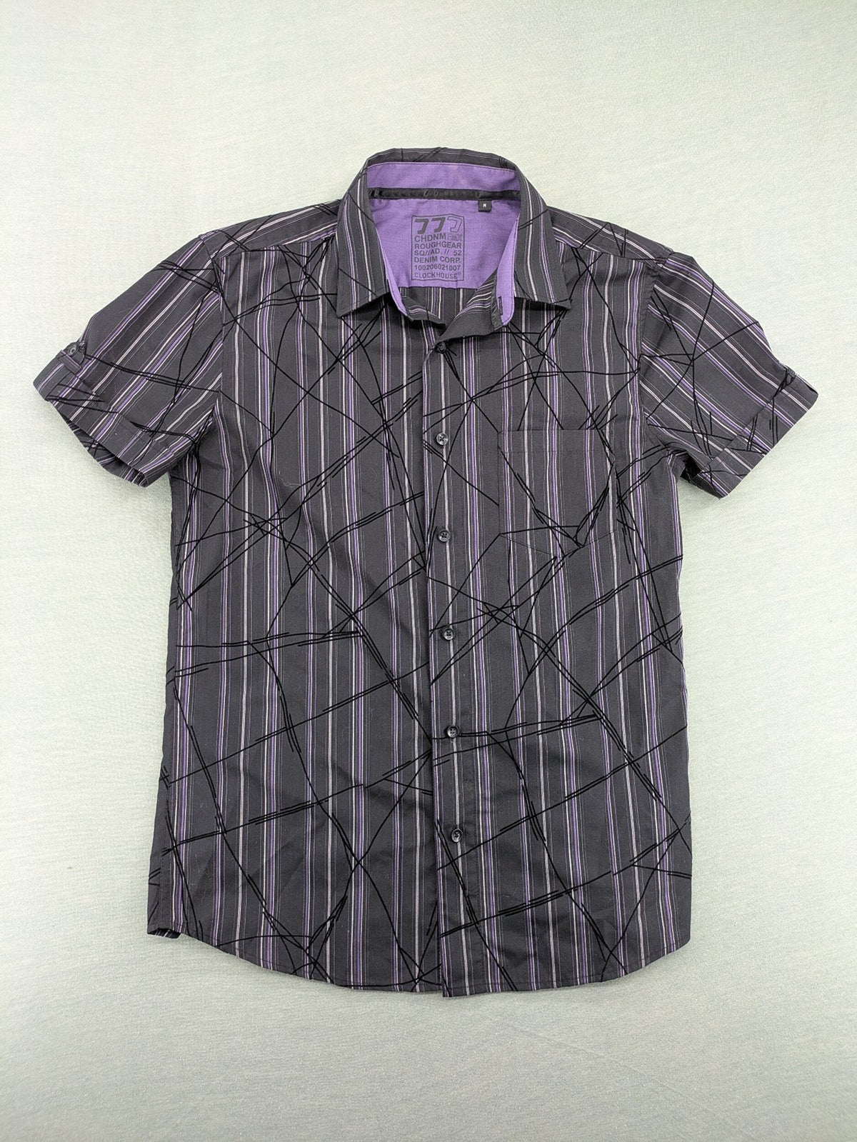 Clockhouse short-sleeve shirt grey purple striped with abstract black graphic pattern and purple collar.