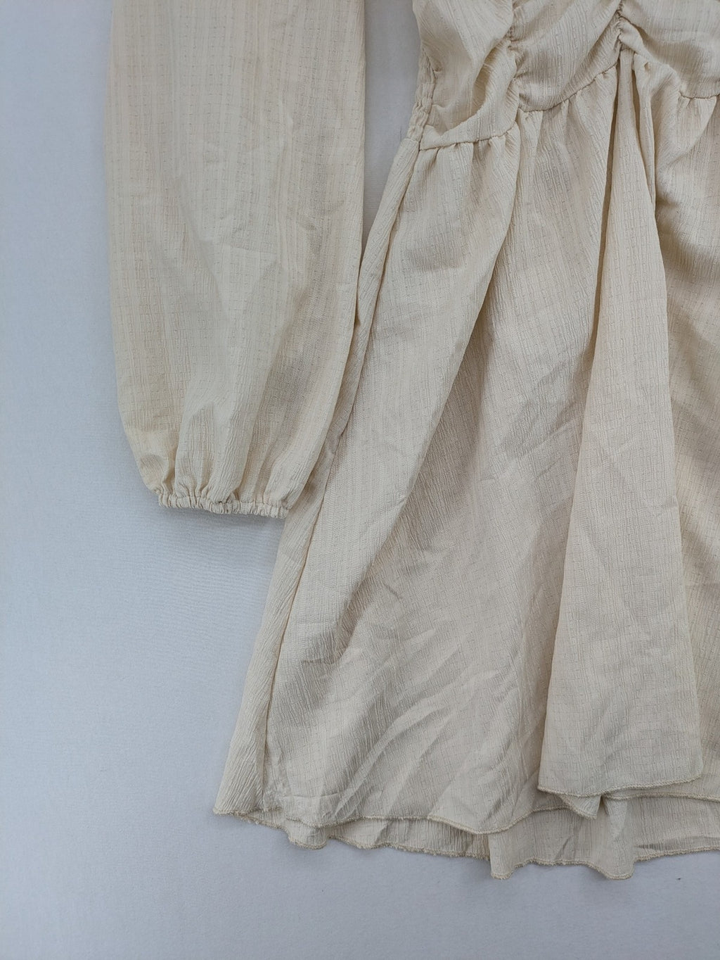 SHEIN beige bridal party dress with V-neck, ruffled bodice, and bishop sleeves.