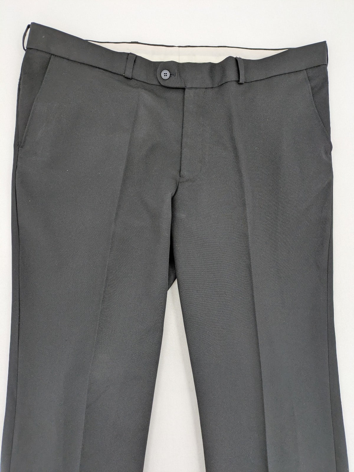 C&A pink pants flat-front design with two side pockets and two back pockets.