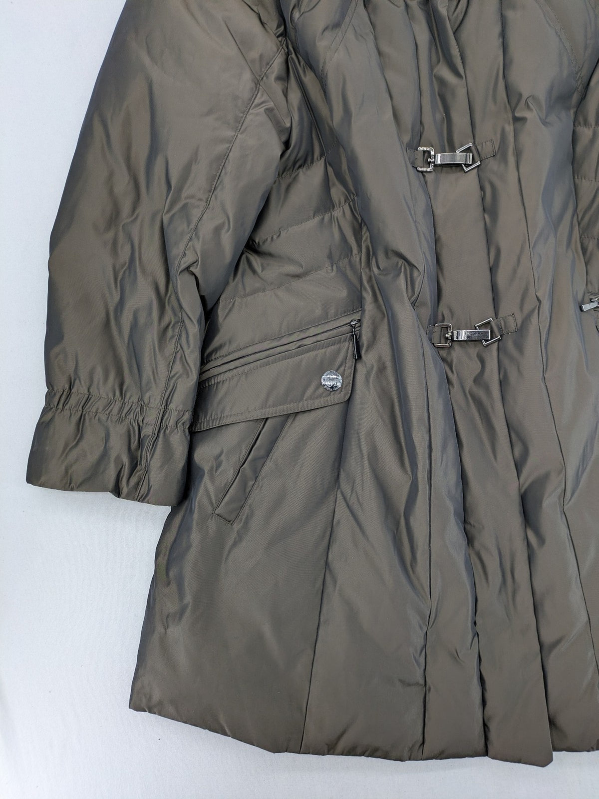 Gerry Weber Edition grey quilted coat with faux fur collar and metal toggle closures.