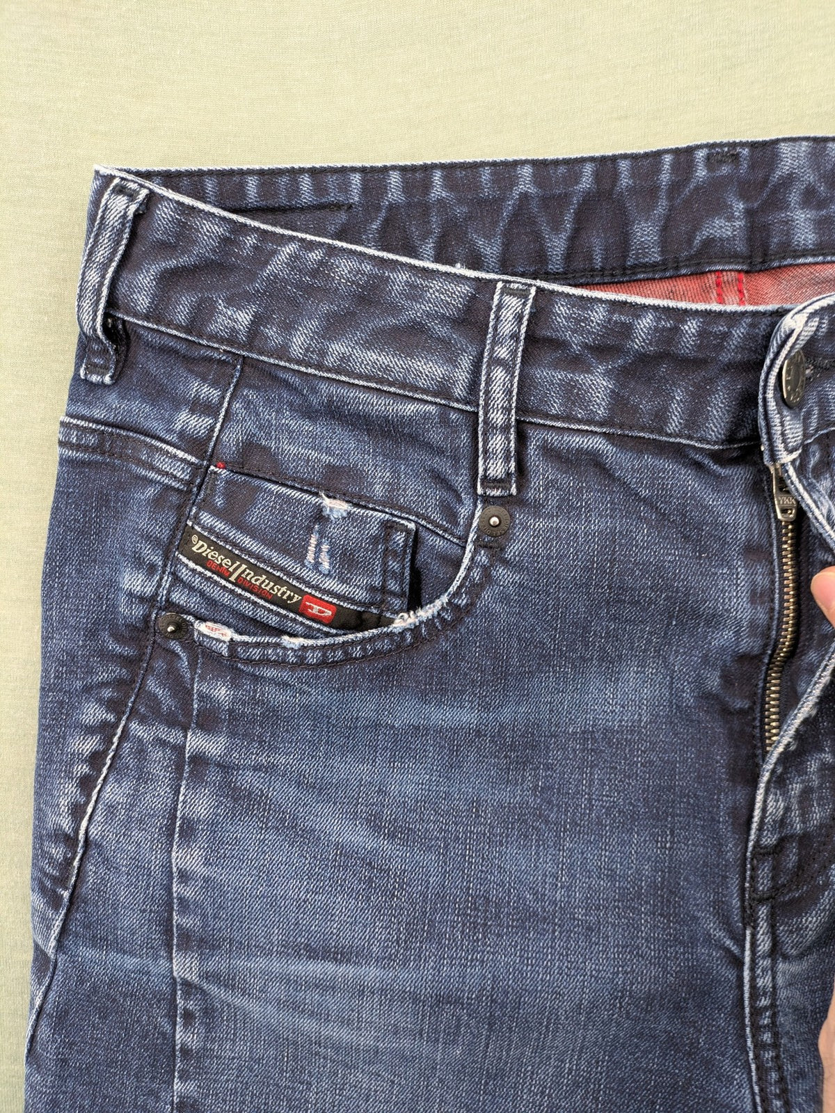 Diesel blue boyfriend jeans low waist dark wash stretch denim with logo patch.