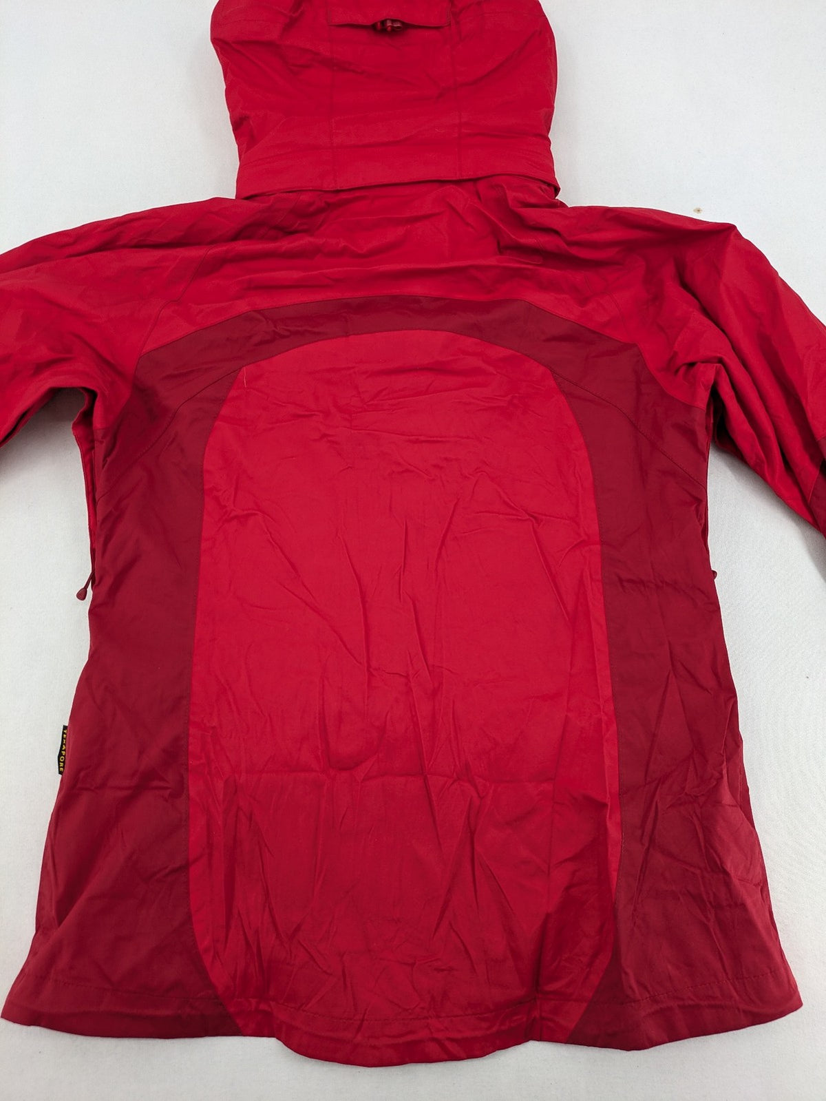 Jack Wolfskin red outdoor jacket with adjustable hood and Texapore waterproof technology