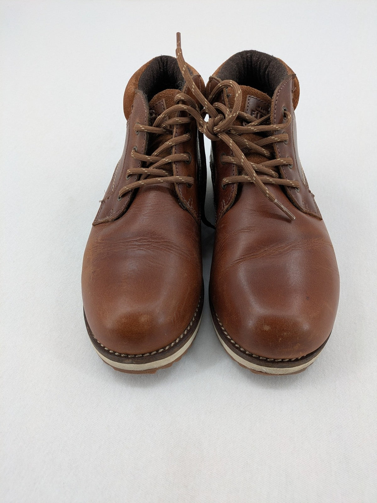 Firetrap brown motorcycle boots with classic lace-up design and padded ankle support.