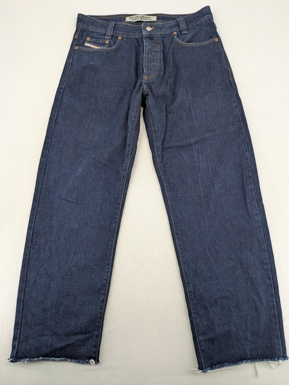 Picaldi blue straight jeans with button fly and frayed hem, 5-pocket design.
